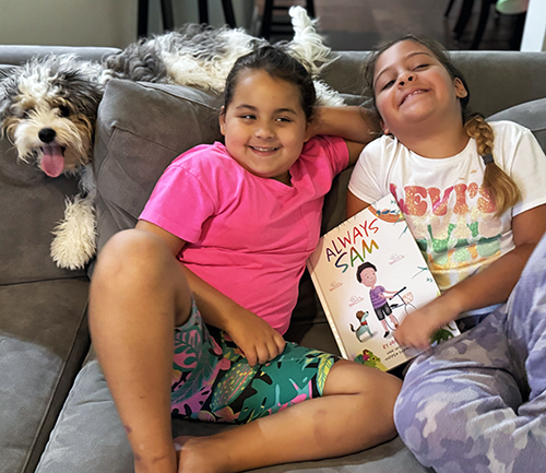 cousins with dog